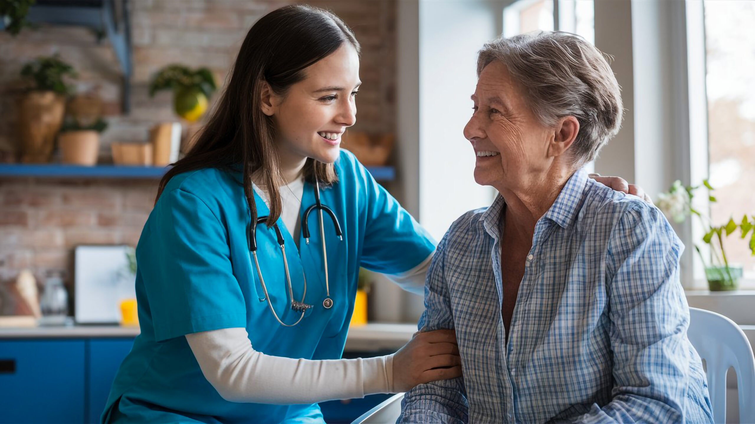Carer supporting an older client with specialist care needs